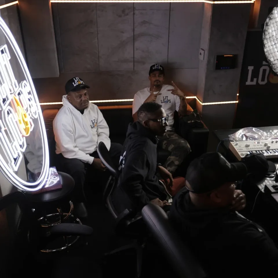 Producers working together in the studio